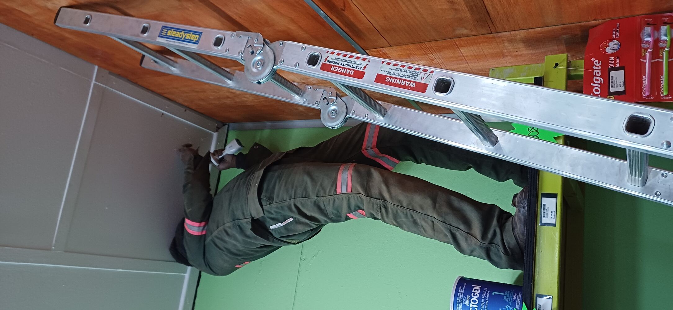 LDI technician installing a ceiling camera